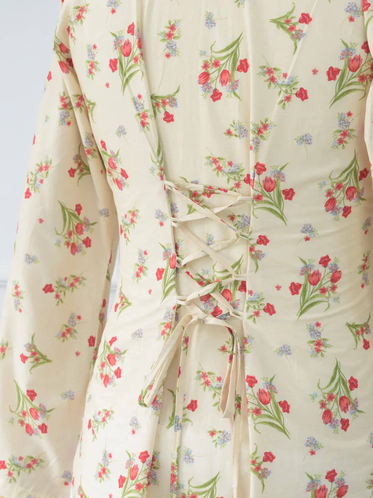 Rosie Bloom beige floral corset kurti – red tulip print lawn cotton, full bell sleeves, V-neckline, smart fit, casual wear Pakistan