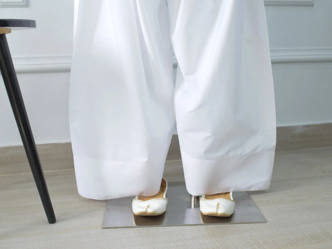 White Farshi Shalwar flat lay – soft cotton, elasticated waistband, traditional gathers, wide flowing silhouette, relaxed fit