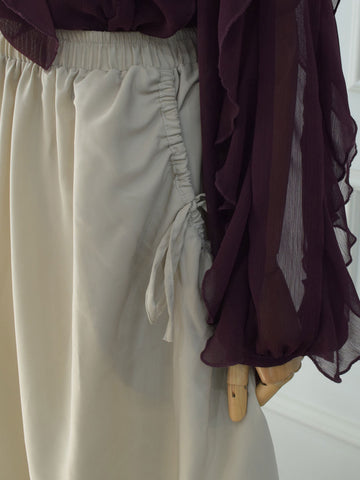 DAZY - BEIGE FLARED SKIRT WITH BOW POCKETS