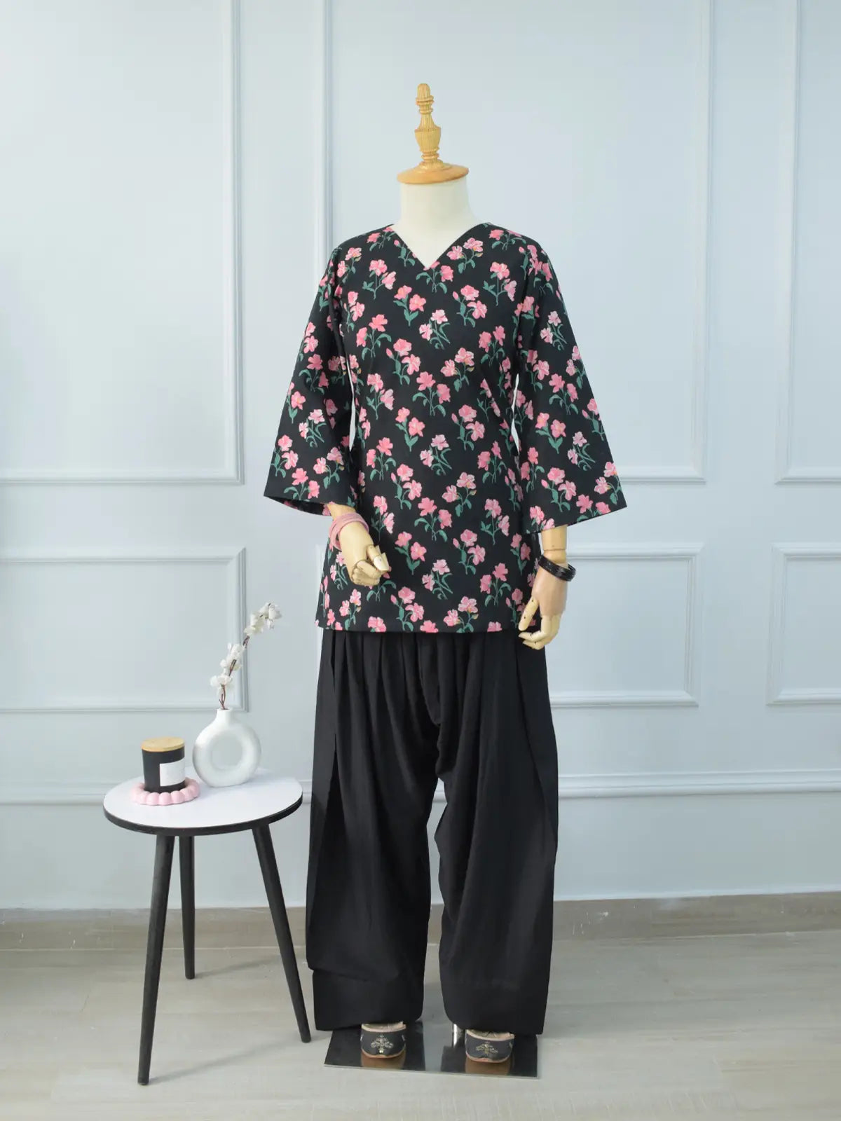 Close-up of corset lace-up back detail on Black Petal black floral kurti – loop eyelets with ribbon tie for adjustable waist fitting
