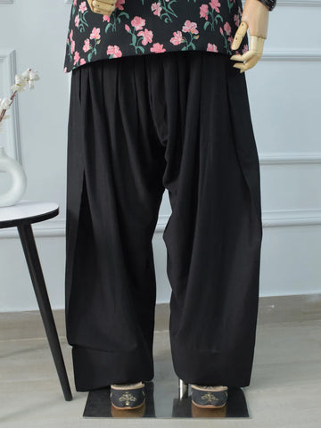 Black Farshi Shalwar flat lay back view – soft cotton, elasticated waistband, traditional gathers, wide leg relaxed fit silhouette