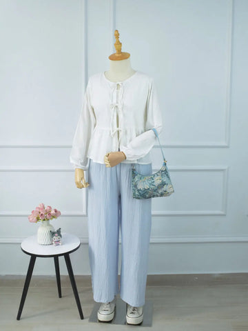 Marina pastel blue wide-leg pants full length clean shot on mannequin – breathable textured fabric, elasticated drawstring waist, relaxed wide-leg fit