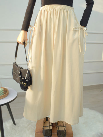 DAZY - BEIGE FLARED SKIRT WITH BOW POCKETS