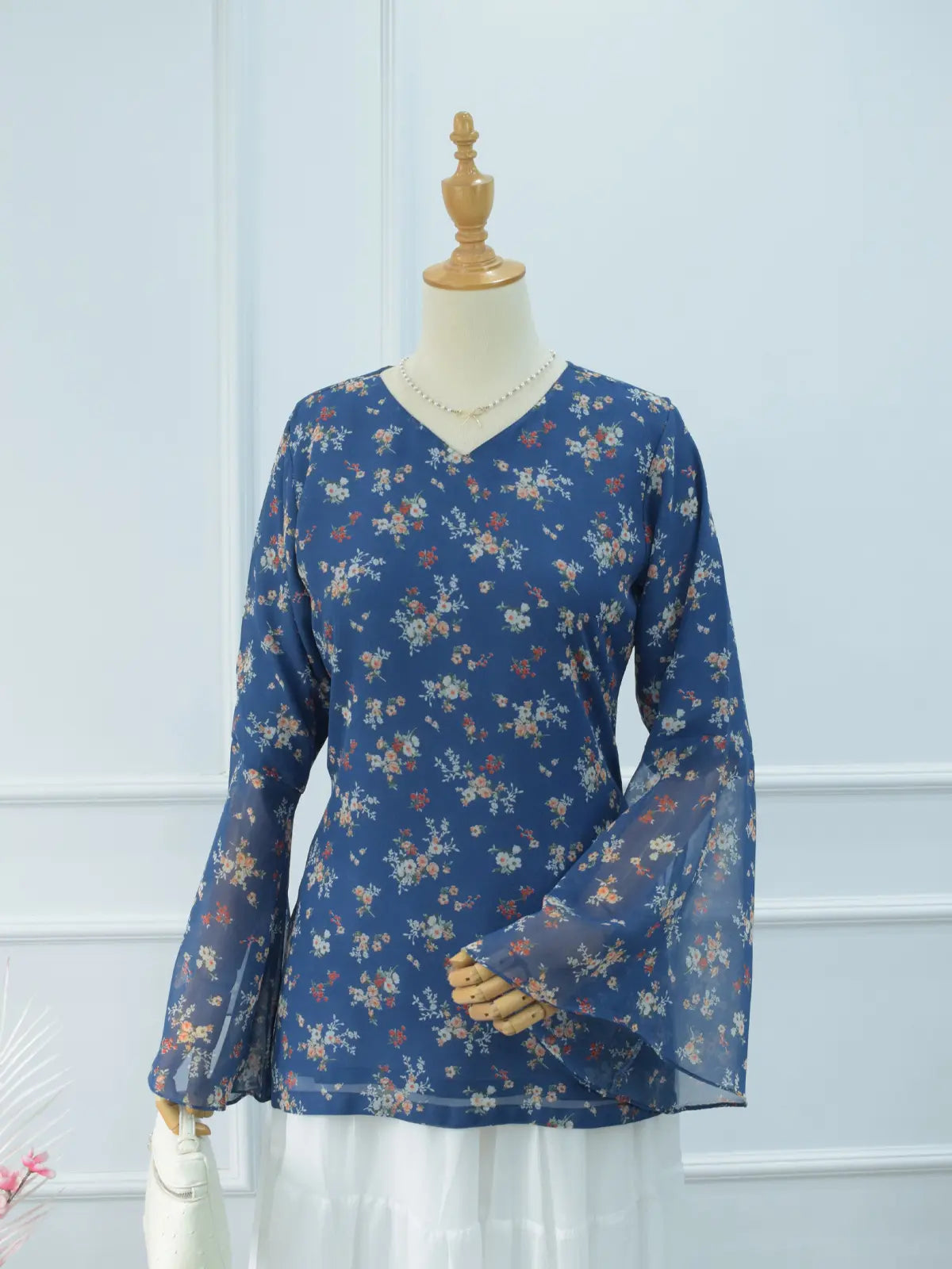 Virelia blue floral fairy kurti flat lay, V-neck bell sleeves