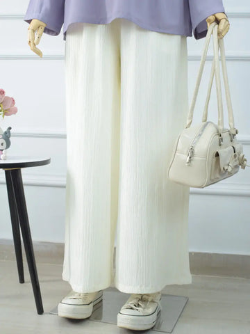 DOVE off-white wide-leg pants styled for a casual everyday look