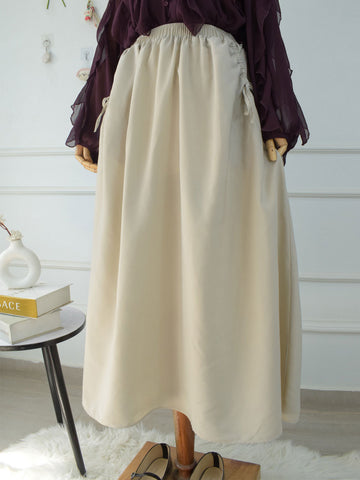 DAZY - BEIGE FLARED SKIRT WITH BOW POCKETS