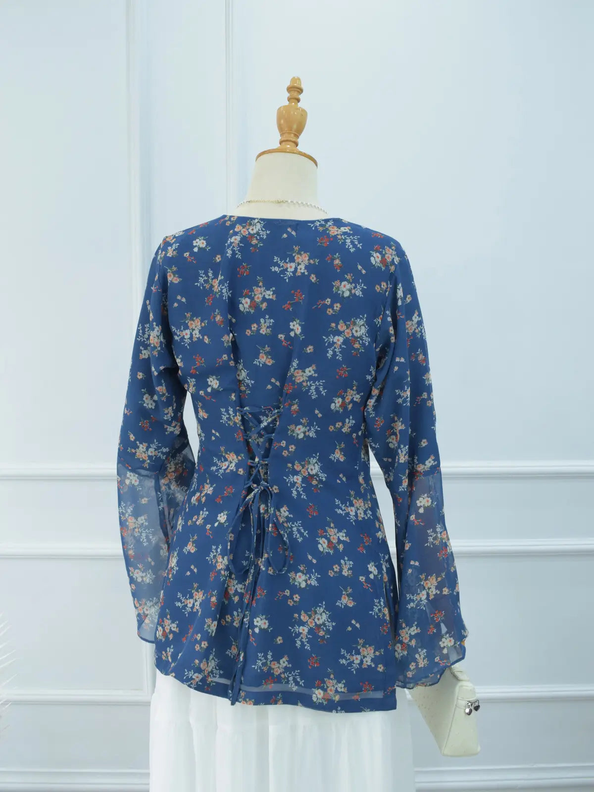 Virelia blue floral kurti back view, corset lace-up detail