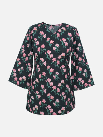 Back view of Black Petal black floral corset kurti – corset lace-up with ribbon tie, quarter sleeves, black shalwar styling on mannequin