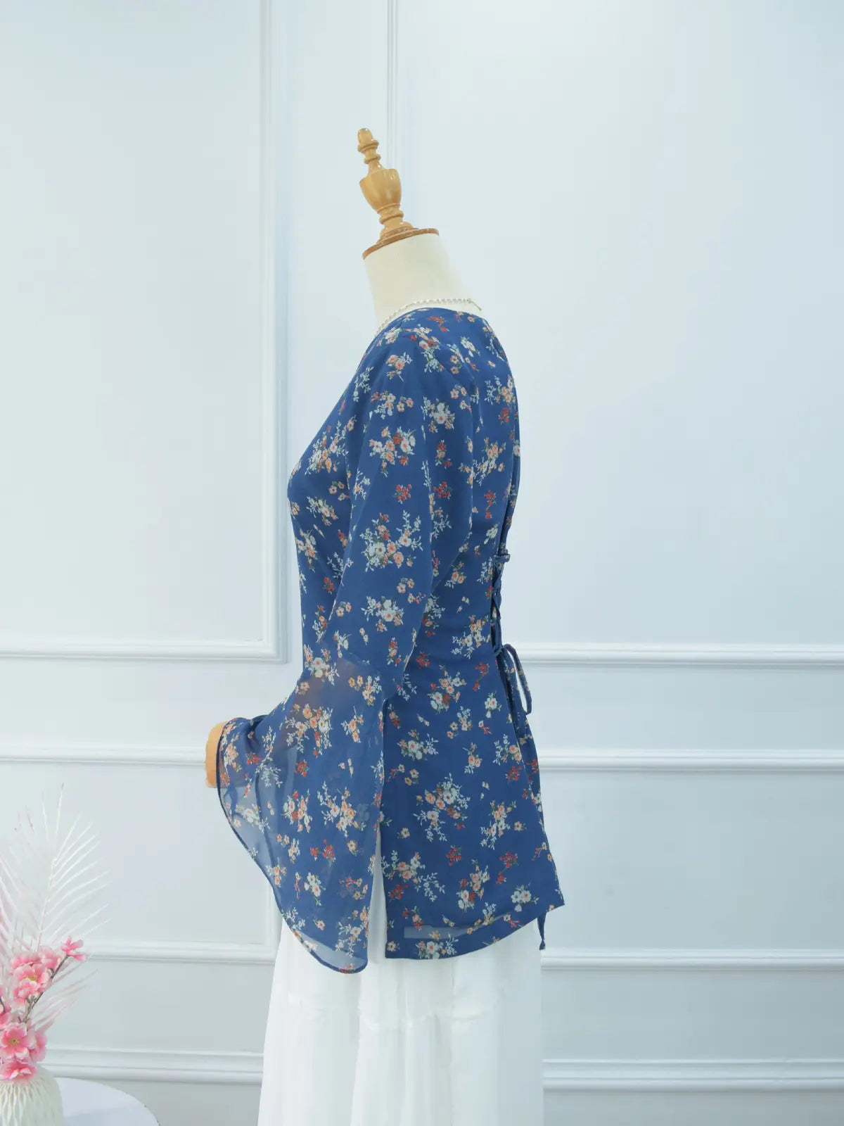 Side view of Virelia blue floral fairy kurti, bell sleeves