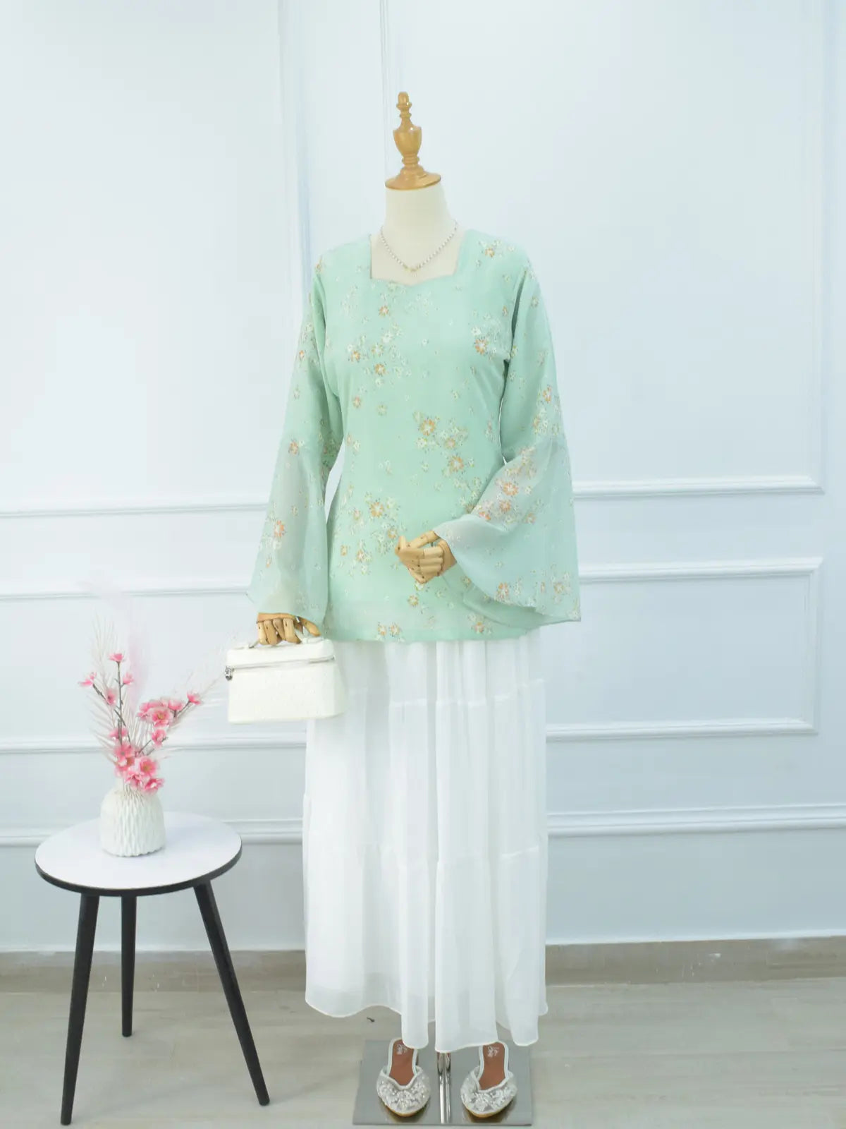Fiora green floral kurti styled with white palazzo, full look