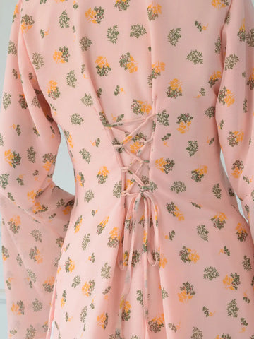 Close-up of corset-style lace-up back with loop eyeletson ROBES Azelia light pink floral kurti