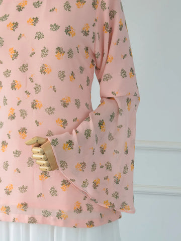 Close-up of sheer chiffon flared bell sleeveon ROBES Azelia light pink floral kurti