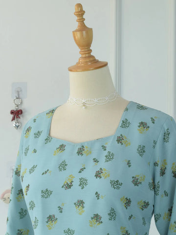 Close-up of square neckline on ROBES Cerelia pastel blue floral chiffon kurti on mannequin