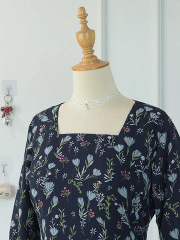 Evalisse navy floral kurti on mannequin — three-quarter front angle showing bell sleeve detail