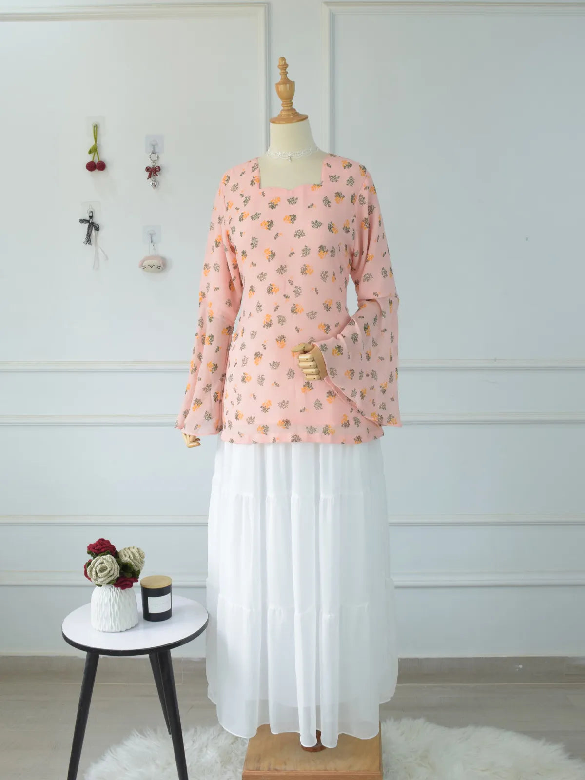 ROBES Azelia light pink floral fairy kurti paired with white skirt_full length front view on mannequin