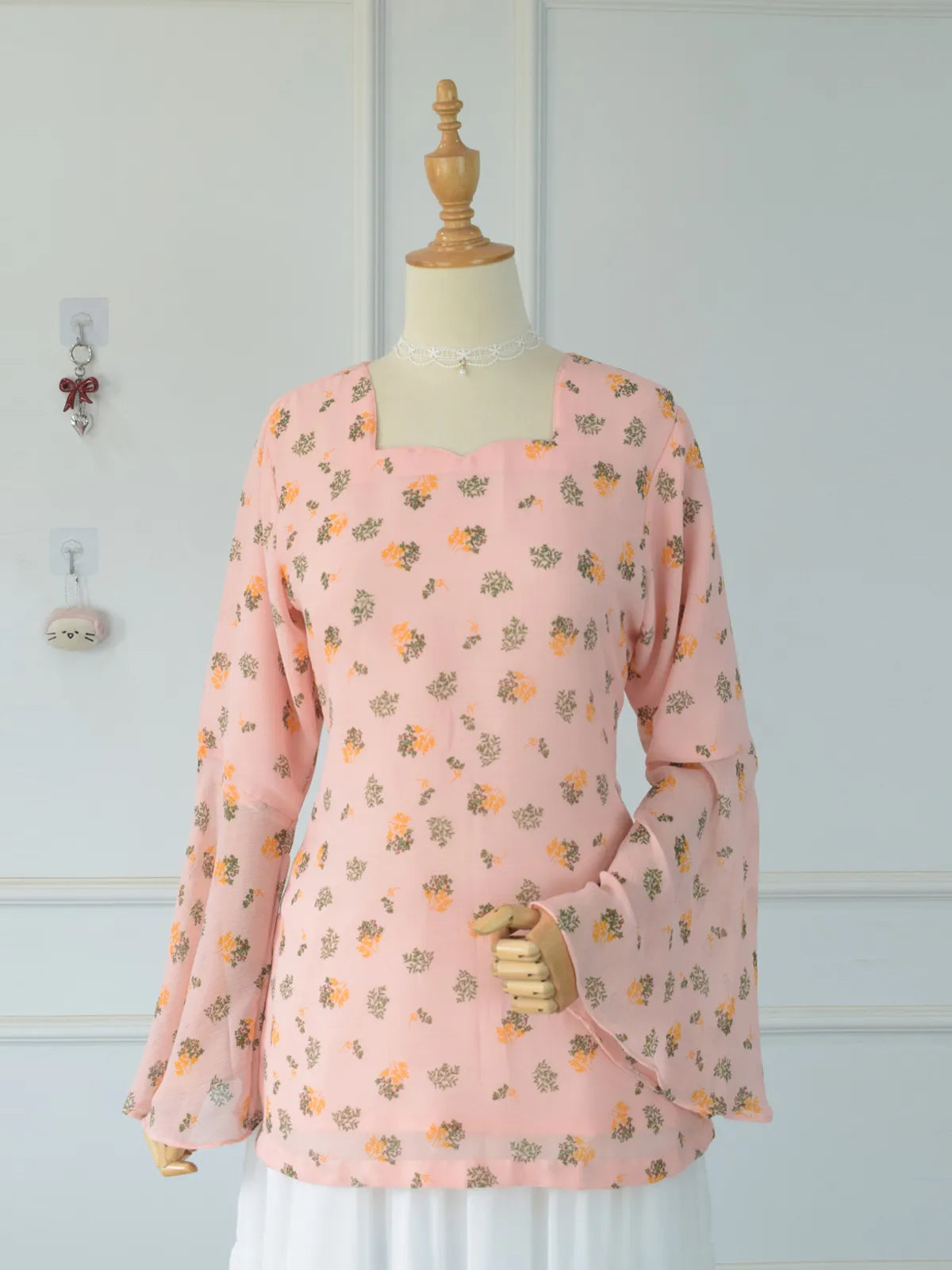 ROBES Azelia light pink floral kurti_front view on mannequin showing full garment and silhouette