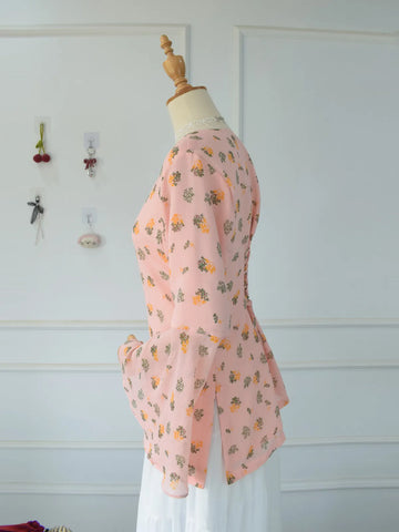 ROBES Azelia light pink floral kurti_side profile view showing fitted waist and bell sleeve silhouette