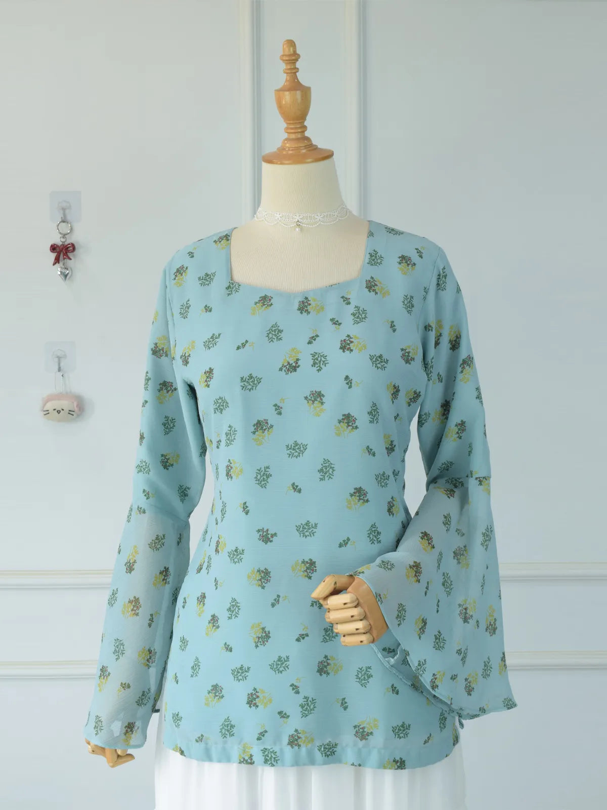 ROBES Cerelia pastel blue floral kurti_front view on mannequin showing full garment and silhouette
